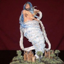 Unknown inmate. This pastime, of Lord Kṛṣṇa with the demon Trnavarta, was made with papier mache, made from toilet paper.